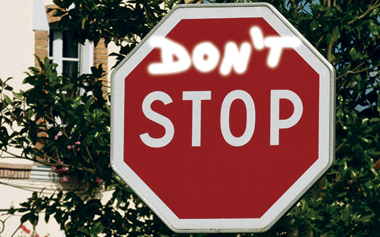 spray painted stop sign